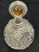 Silver topped scent bottle
