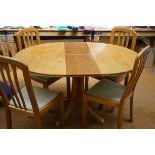 Extending dining table & 4 chairs