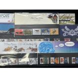 11 Packs of Royal Mint, mint stamps