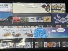 11 Packs of Royal Mint, mint stamps