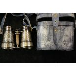 Brass binoculars in leather case royal navy