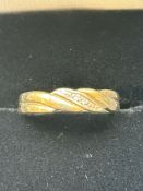 9ct gold crossover ring set with diamonds Size M 2