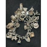 Silver charm bracelet - 28 charms