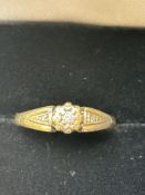 9ct Gold ring set with 3 diamonds Size O 2g
