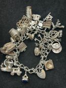 Silver charm bracelet - 28 charms