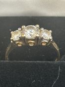 9ct Gold ring set with 3 white stones Size N