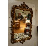 Ornate gilt framed mirror