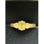 9ct Gold ring set with 3 light green stones Size O