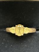 9ct Gold ring set with 3 light green stones Size O