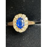 9ct Gold ring set with blue gem stone & white stones Size M
