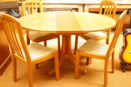 Extending dining table & 4 chairs