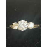9ct Gold ring set with 3 white stones Size O