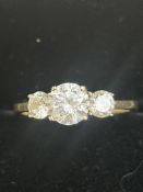 9ct Gold ring set with 3 white stones Size O
