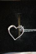 9ct White gold chain with heart shaped pendant set