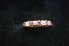 9ct Gold ring set with 5x rubies & 4 diamonds Size