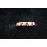 9ct Gold ring set with 5x rubies & 4 diamonds Size