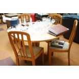 Extending dining table & 4 chairs
