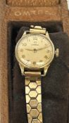 9ct Gold Omega ladies wristwatch - plated strap