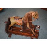 Early rocking horse, fully restored December 2002.