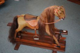 Early rocking horse, fully restored December 2002.