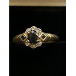 9ct Gold ring set with sapphires & diamonds Size O