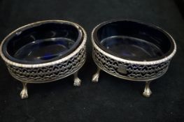 Pair of Victorian silver salts with blue glass lin