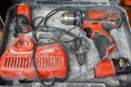Milwaukee case drill set with charger
