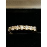 9ct Gold ring set with 7 cz stones Size M 2.3g