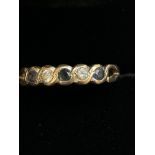 9ct Gold ring set with sapphires & cz stones Size