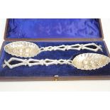 Boxed pair white metal spoons