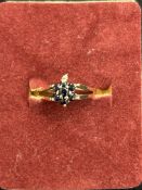 9ct Gold ring set with sapphire cluster Size M.5