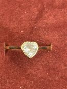 9ct Gold ring set with heart shaped white stone Si