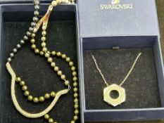 2x Swarovski necklace & pendants with original box