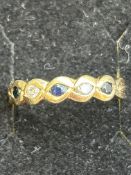 9ct Gold ring set with sapphire & diamonds Size Q