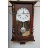 Wall clock with pendulum & key