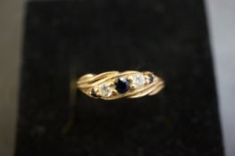 9ct Gold ring set with sapphire & cz Size N