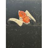 9ct White gold ring set with 2 orange sapphires &