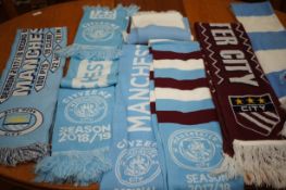 Collection of Manchester city football scarfs