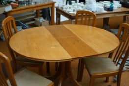 Extending dining table & 4 chairs