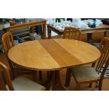 Extending dining table & 4 chairs