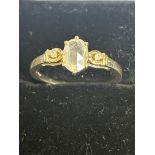 9ct Gold ring set with white sapphire & 2 diamonds