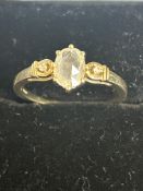 9ct Gold ring set with white sapphire & 2 diamonds