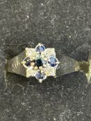 9ct white gold cluster ring set with white and blu