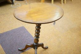 A small Victorian top table with bobbin turn under