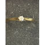 9ct gold ring set with small solitaire diamond Siz