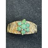 9ct gold ring set with green hard stones Size M -