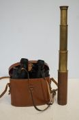 Brass and leather telescope and a pair of Aquils b