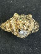 9ct gold lion ring set with white stone in the lio