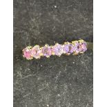 9ct gold ring set with 7 amethyst Size N