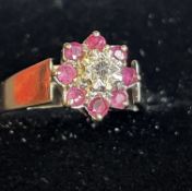 9ct white gold cluster ring set with central diamo